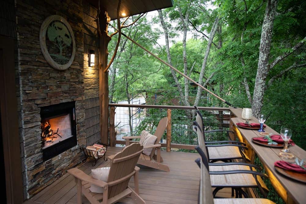 private deck of a treehouse resort in the Smoky Mountains